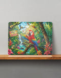 Colorful MDF wooden puzzle showing a jungle scene with a red parrot, waterfall, toucan, frog, and "Welcome to the Jungle" sign